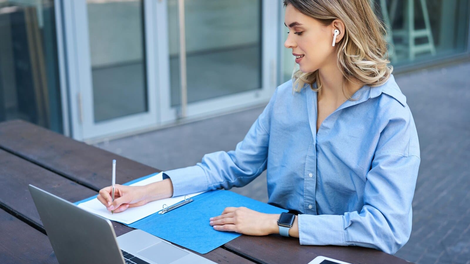 Young professional preparing notes for a digital marketing job interview