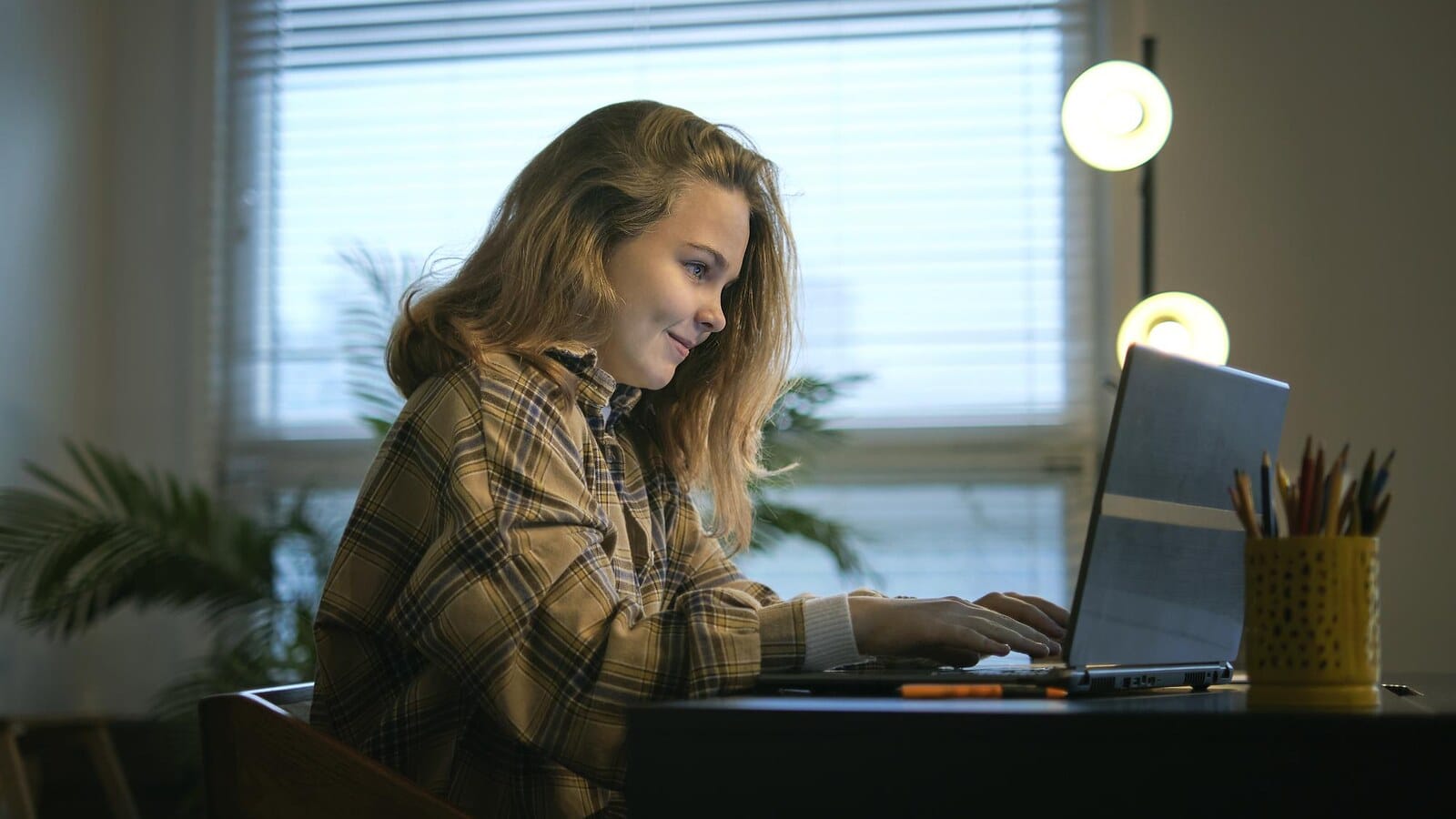 Student planning how to start earning money online with a laptop